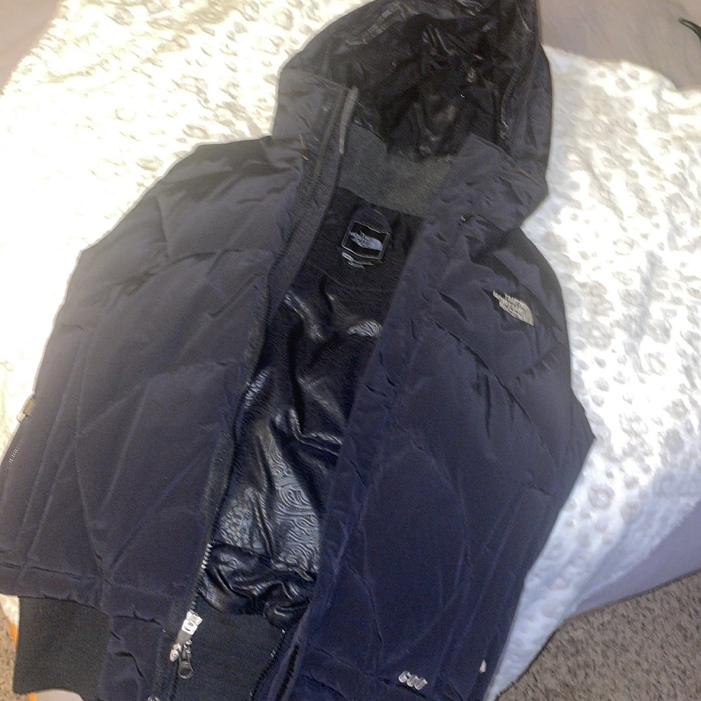 Brand new me medium women’s North face vest with hood